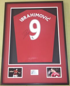 Signed Ibrahimovic shirt and photos